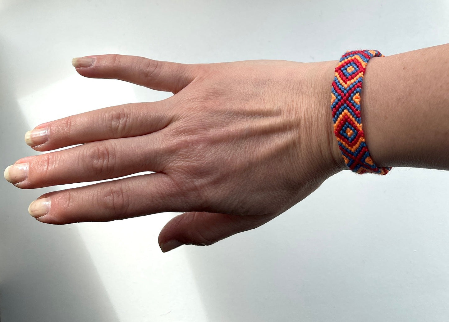Red, Blue and Orange Handmade Friendship Bracelet